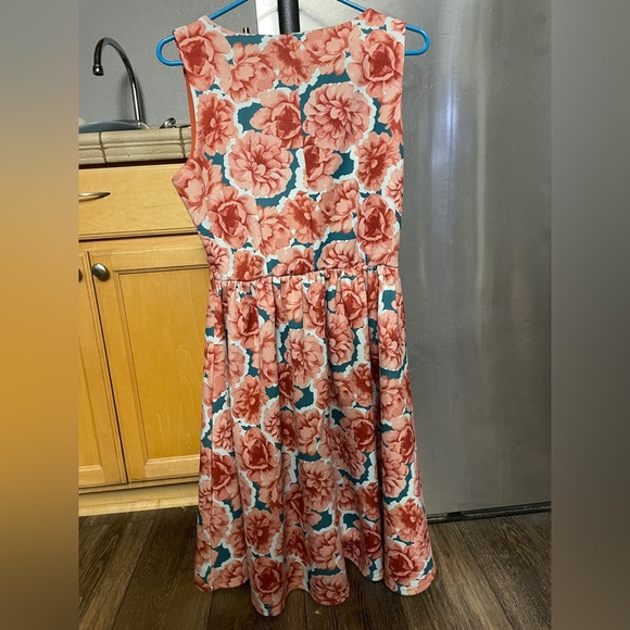 Beautiful floral dress worn for a wedding once, been hanging in my closet since. - Picture 2 of 4